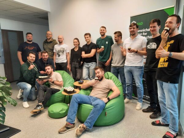 Picture of the Polish team celebrating the company's 8 birthday
